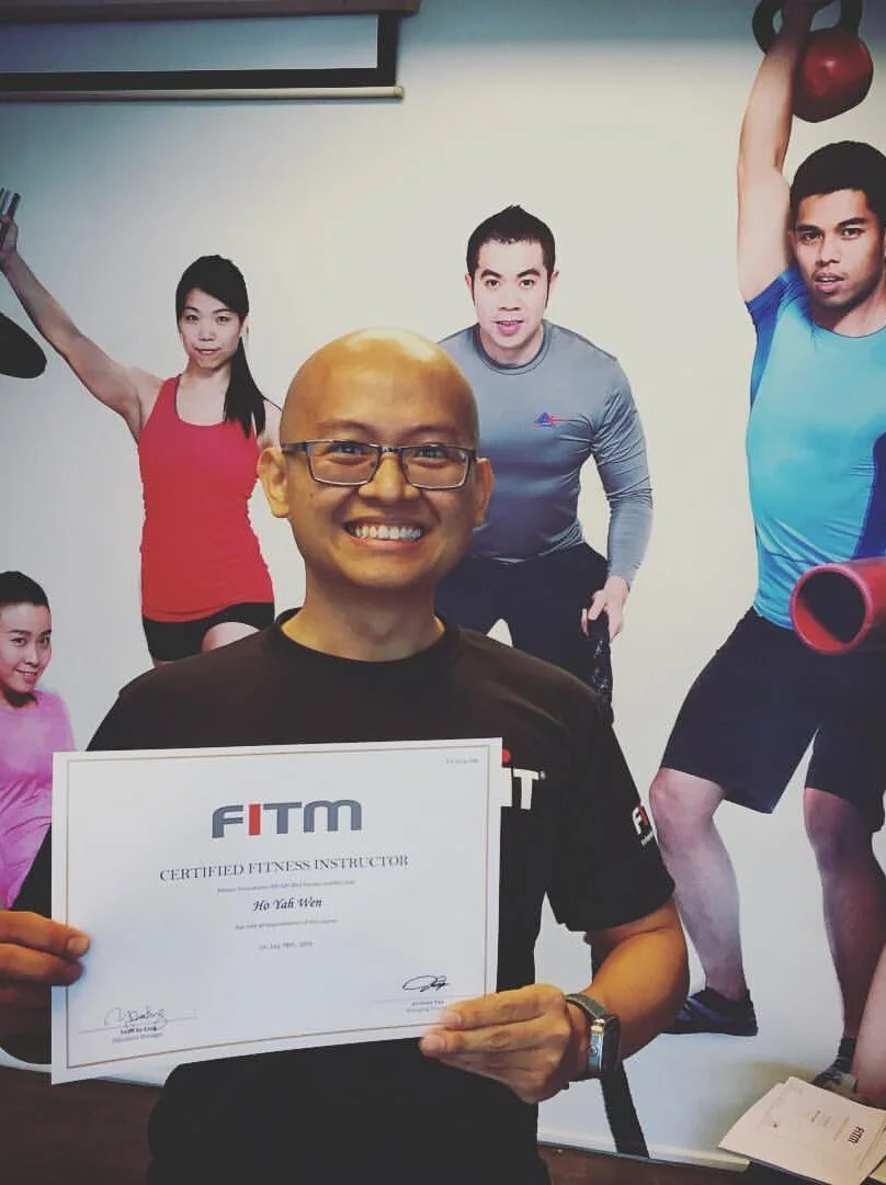 Coach Ho Yah Wen receiving his first fitness instructor certification